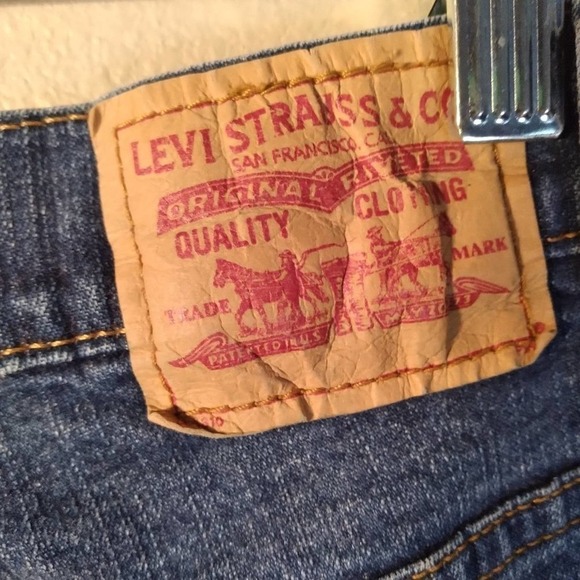 Levi's 550 Relaxed Bootcut Medium Wash Jeans Size 12 - Picture 7 of 10
